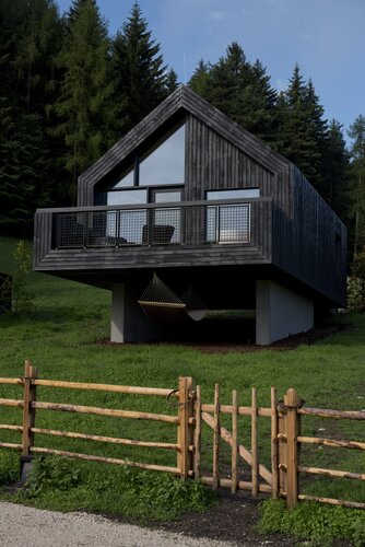 Aussenansicht_Waldchalet__c__Hotel_Pfoesl_Morgenstern.jpeg