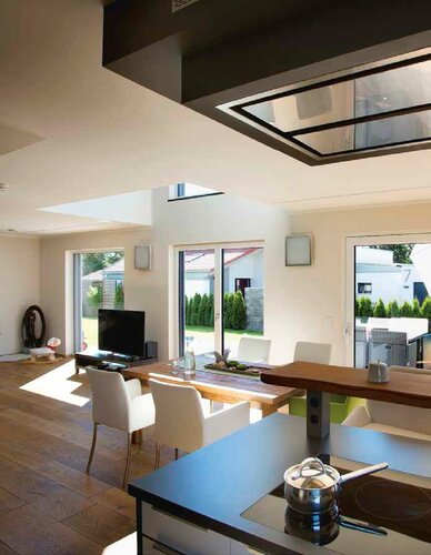 Als ein einziger großer Raum sind die Bereiche Wohnen/Essen/Kochen im Erdgeschoss angelegt Foto: Kneer-Südfenster gB_93_S50_Design_Raum_Wohnen-Essen-Kochen.jpg
