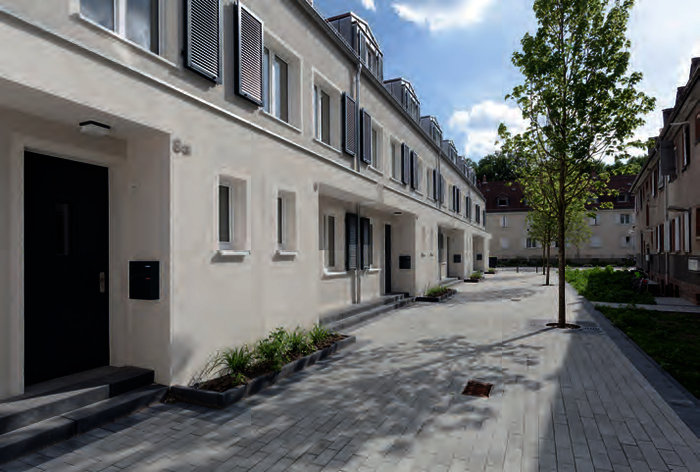 16 Reihenhäuser entstanden kostengünstig durch Nachverdichtung in der ehemaligen Arbeitersiedlung Frankfurt-Riederwald.