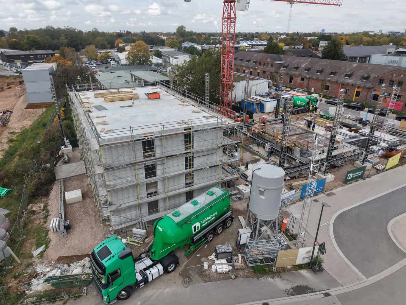 Auf dem ehemaligen US-Areal Campbell in Heidelberg entsteht derzeit ein revolutionäres Wohnbaukonzept: Das Projekt DREIHAUS © Heidelberg Materials AG