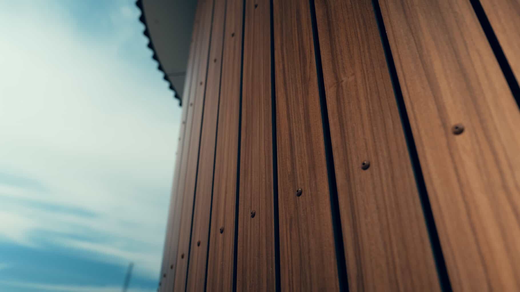 Die im Stil einer Holz-Lattung vertikal verarbeiteten Trespa Meteon-Platten in der Designlinie Wood Decors sind mit der Unterkonstruktion verschraubt. © Trespa International