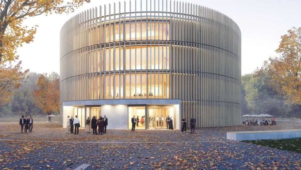 Bild 1: Visualisierung des viergeschossigen „Globe Theaters“. Der Eingangsbereich zeigt sich hell erleuchtet und öffnet sich innen nach oben über alle Geschosse. Für den Blick von innen nach außen hat man die Abstände der Lamellen der Fassade groß gewählt. © yos.ch Visualisierungen