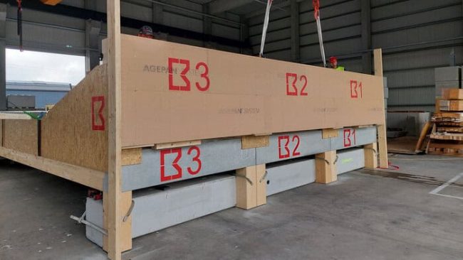 Als Experte für hybride Bauweisen stehen für Brüninghoff die Weiterentwicklung und Optimierung der hybriden Decken- und Wandelemente stets im Fokus – unter ökologischen aber auch unter ökonomischen Aspekten. Dazu wurden umfangreiche Rückbauversuche durchgeführt. Der Versuchsaufbau besteht aus drei Deckenelementen