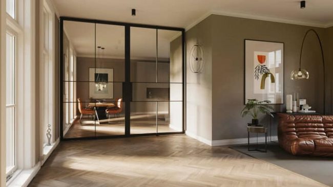 Die Pivottüren von Hörmann schaffen eine reduzierte Profilansicht ohne Türrahmen und eignen sich besonders für breite Durchgänge. © Hörmann